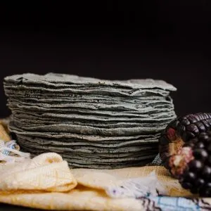 Stack of homemade tortillas made with organic blue cornmeal from War Eagle Mill
