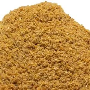 Pile of golden War Eagle Mill Organic Flax Meal – finely milled for baking and smoothies.